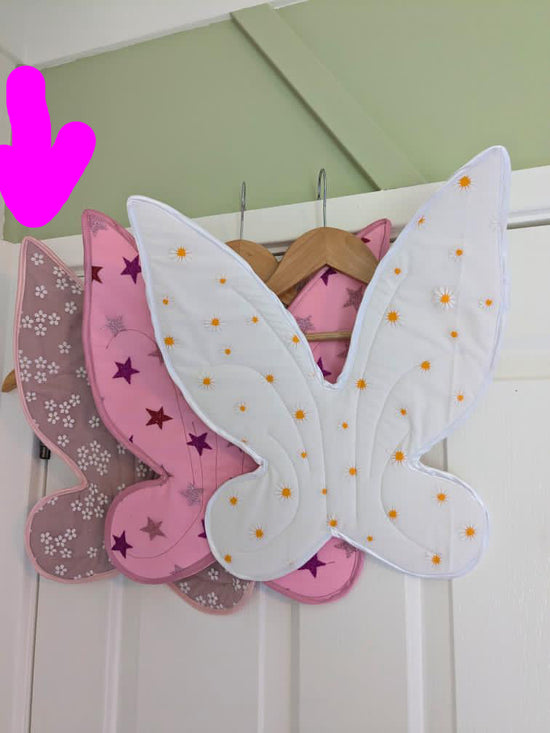 Dusty Pink Wings featured at the back